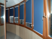 Остекление лоджий деревянными окнами с рулонными шторами