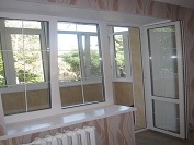 Балконные пластиковые окна со шпросами