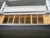 Остекление деревянными балконными рамами